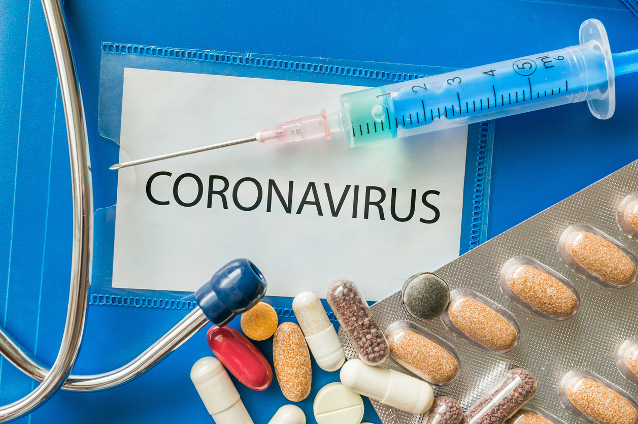Novel coronavirus disease 2019-nCoV written on blue folder.